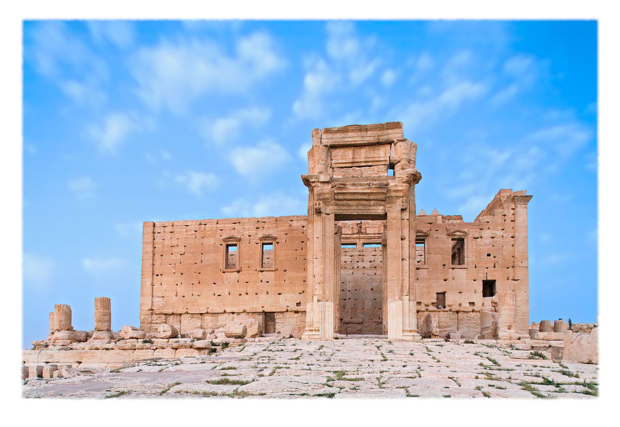 Entrance ramp to the Temple of Baal. Inside the cella and to the left were three platforms for votive offerings. Inside and to the right was the cultic image —now long gone— beneath a wondrous geometric-carved ceiling. Only the entrance portico still stands.