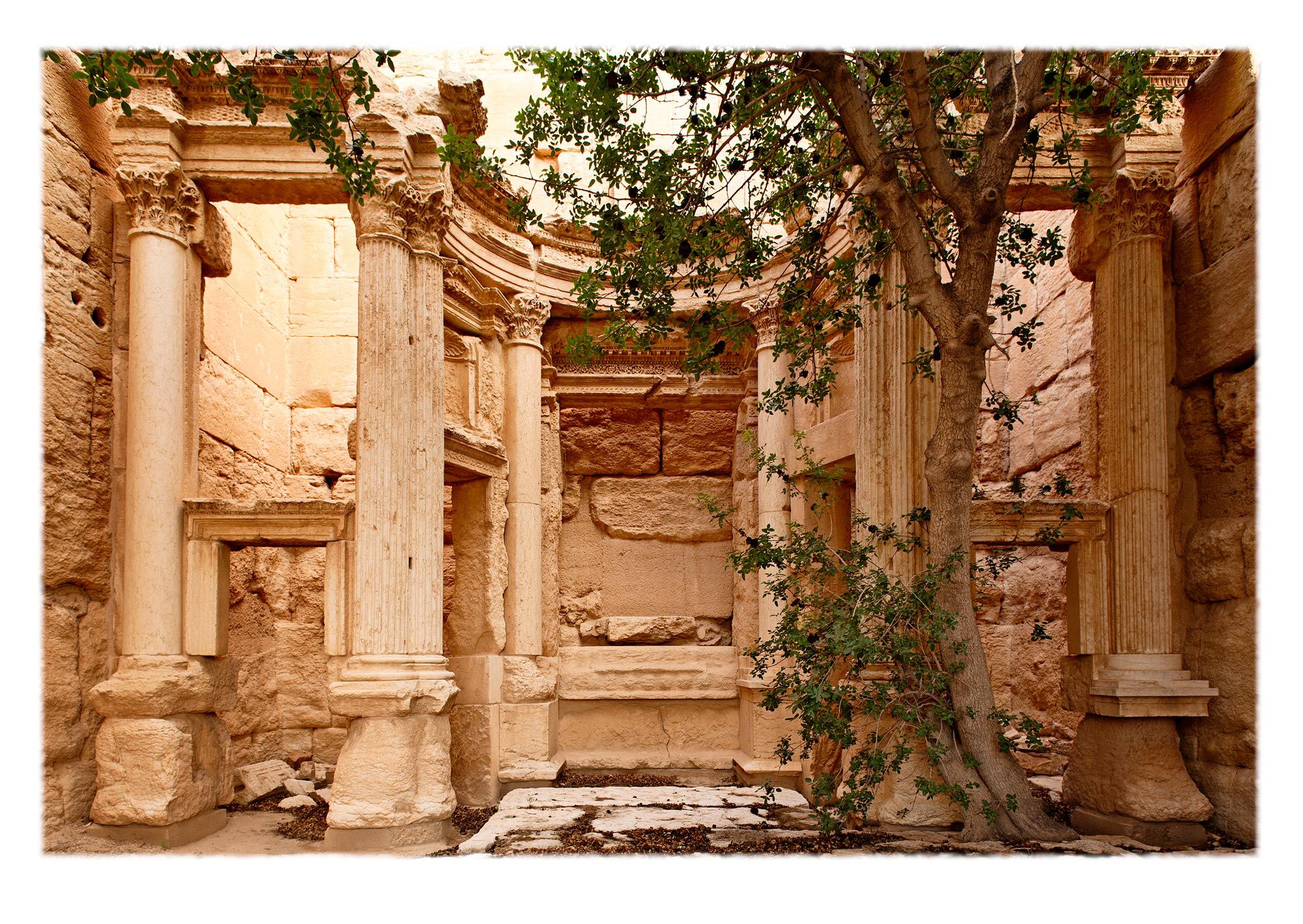 The central apse for votive offerings and cultic image(s) of the Semitic deity Baal. This niche is surrounded on both sides by two adyta, or private chambers serving both as reliquary and office for the priests. priestesses, oracles and acolytes.