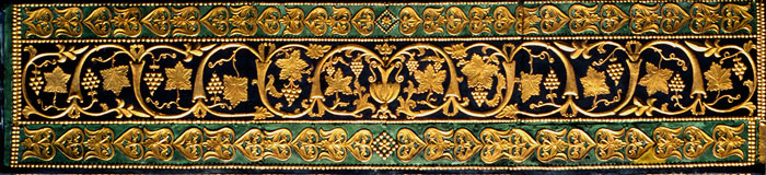 Gilt repousse on tie-beam