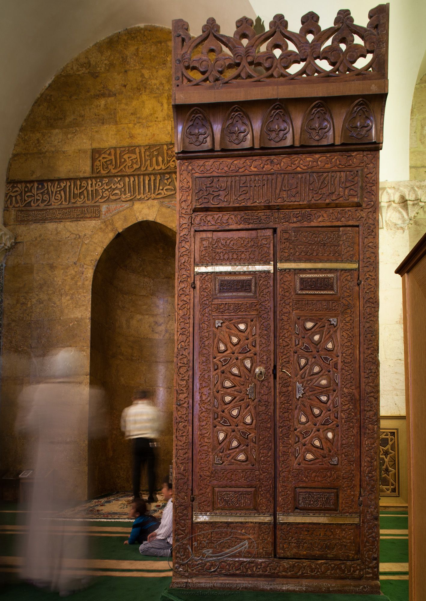 "Mihrab and Minbar, Front."    The late-13th / early-14th c. Mamluk minbar, or pulpit, of Sultan al-Nasir Muhammad, the ninth Mamluk Sultan from Cairo and son of Qalawun. The minbar was located in the Umayyad Mosque in Aleppo, Haleb, prior to its damage and disappearance in May 2013.