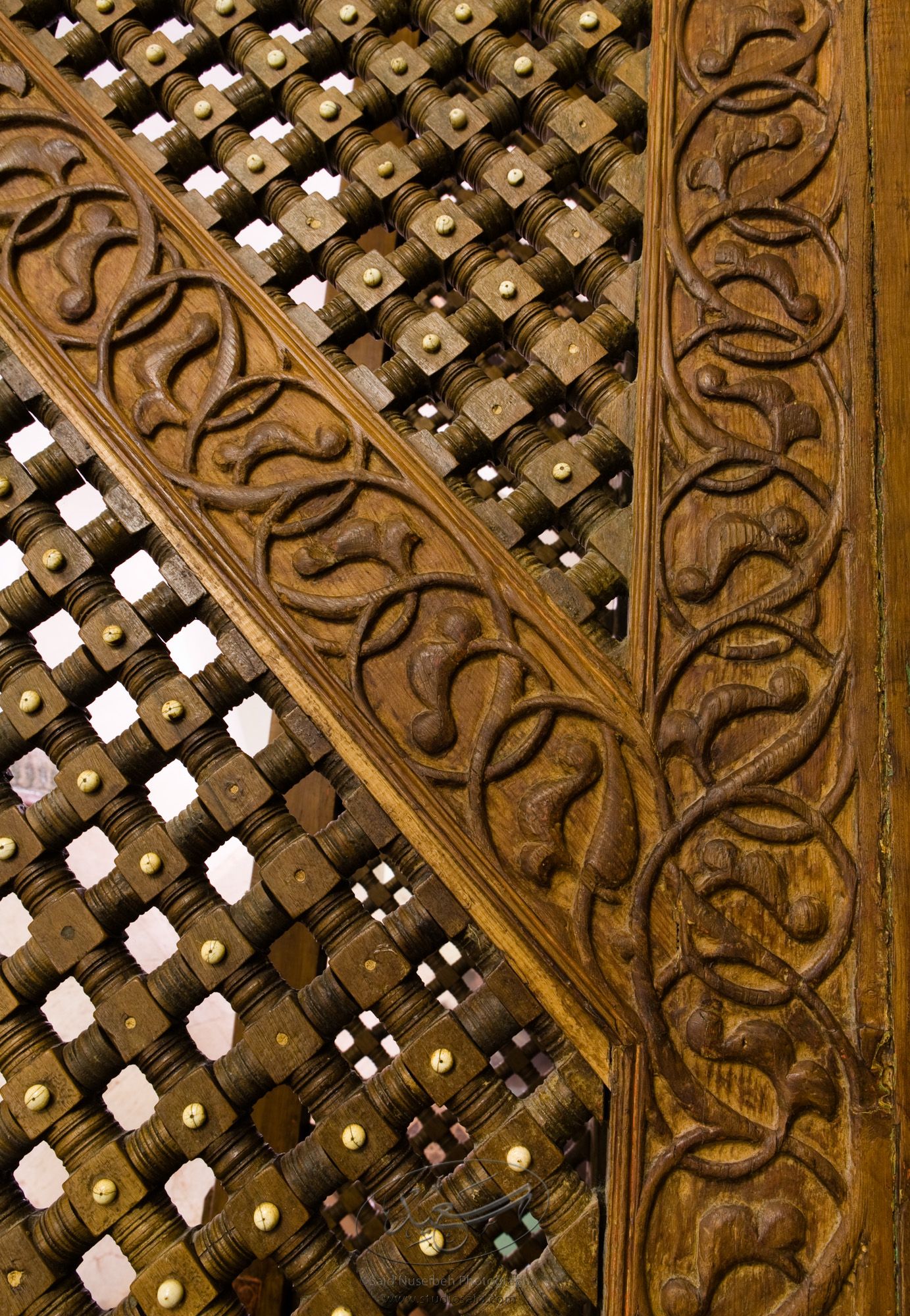 "Mashrabiyya and Floral Interlace. Minbar, Carved Woodwork Detail"The late-13th / early-14th c. Mamluk minbar, or pulpit, of Sultan al-Nasir Muhammad, the ninth Mamluk Sultan from Cairo and son of Qalawun. The minbar was located in the Umayyad Mosque in Aleppo, Haleb, prior to its damage and disappearance in May 2013.