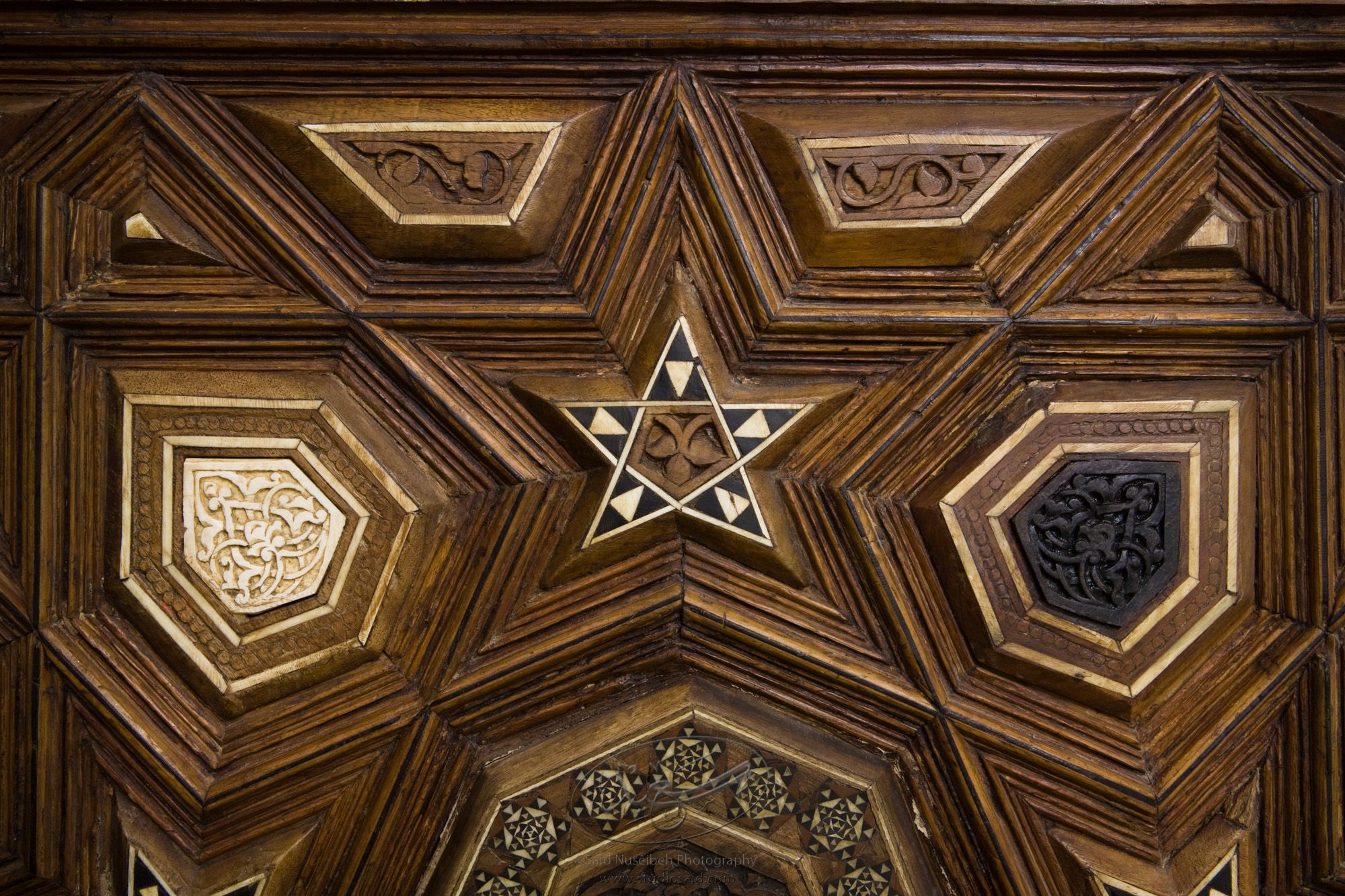 "Minbar, Carved Woodwork and Inlay Detail"The late-13th / early-14th c. Mamluk minbar, or pulpit, of Sultan al-Nasir Muhammad, the ninth Mamluk Sultan from Cairo and son of Qalawun. The minbar was located in the Umayyad Mosque in Aleppo, Haleb, prior to its damage and disappearance in May 2013.