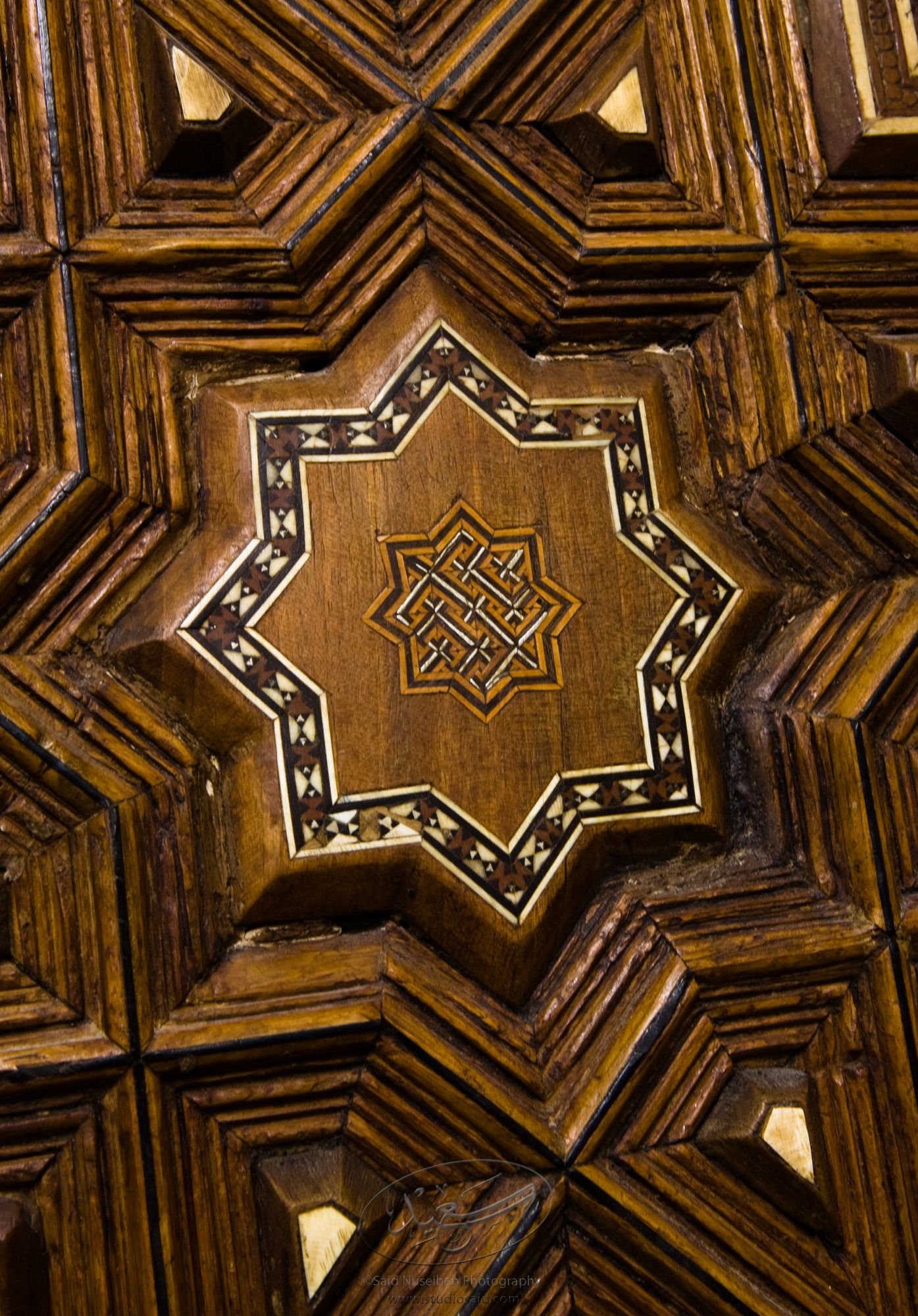 "Octagons. Minbar, Carved Woodwork and Inlay Detail"The late-13th / early-14th c. Mamluk minbar, or pulpit, of Sultan al-Nasir Muhammad, the ninth Mamluk Sultan from Cairo and son of Qalawun. The minbar was located in the Umayyad Mosque in Aleppo, Haleb, prior to its damage and disappearance in May 2013.