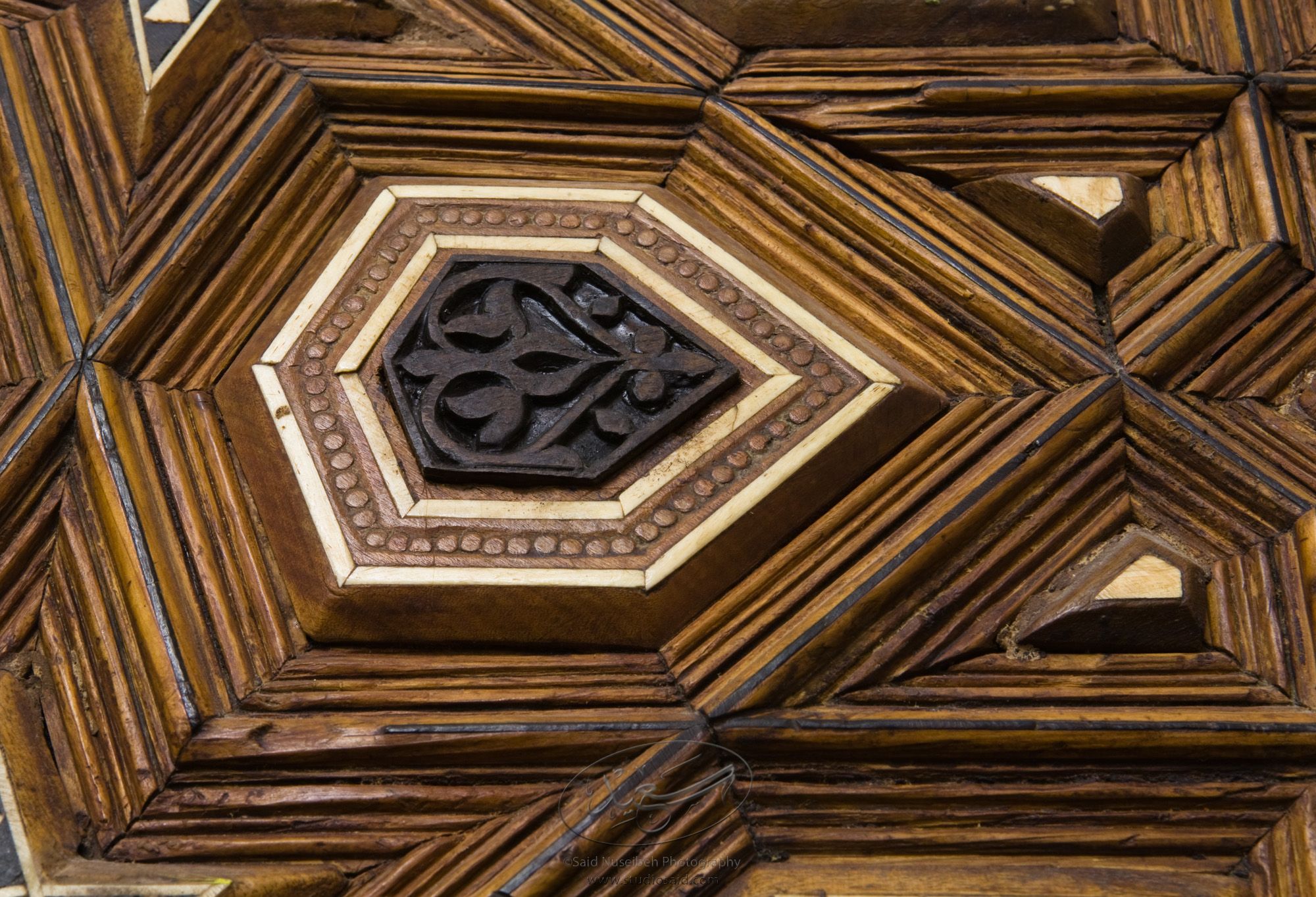 "Minbar, Carved Woodwork and Inlay Detail"The late-13th / early-14th c. Mamluk minbar, or pulpit, of Sultan al-Nasir Muhammad, the ninth Mamluk Sultan from Cairo and son of Qalawun. The minbar was located in the Umayyad Mosque in Aleppo, Haleb, prior to its damage and disappearance in May 2013.