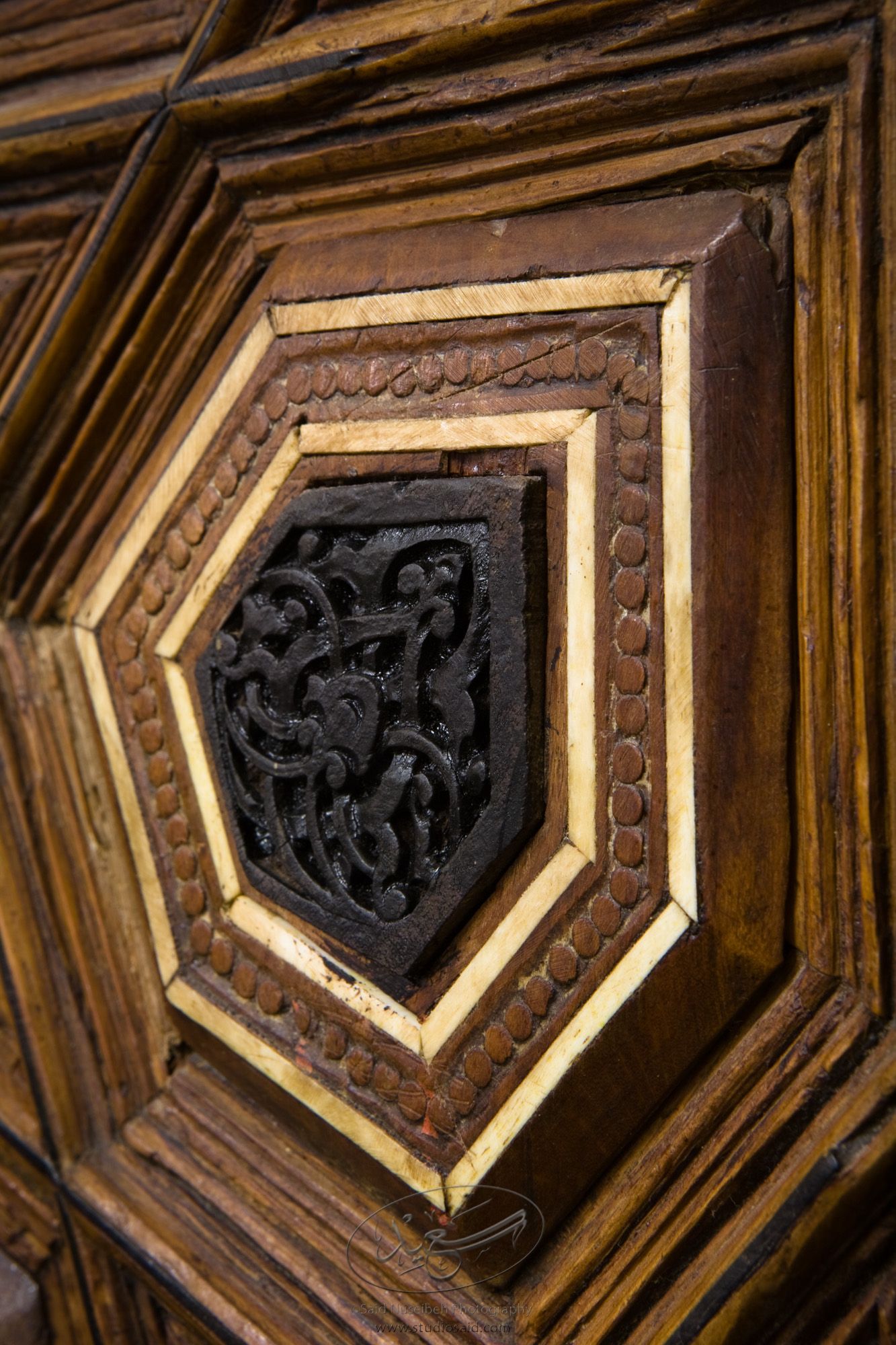 "Minbar, Carved Woodwork and Inlay Detail"The late-13th / early-14th c. Mamluk minbar, or pulpit, of Sultan al-Nasir Muhammad, the ninth Mamluk Sultan from Cairo and son of Qalawun. The minbar was located in the Umayyad Mosque in Aleppo, Haleb, prior to its damage and disappearance in May 2013.