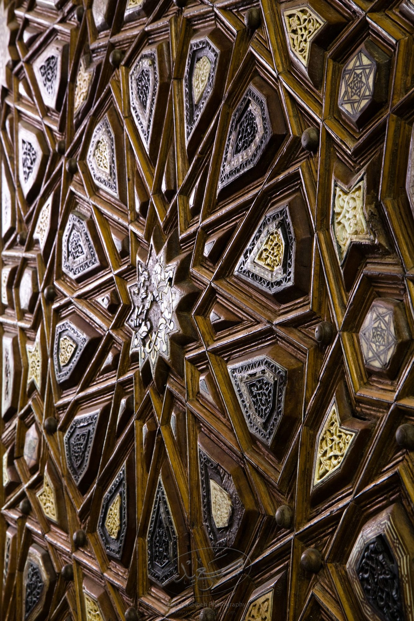 "Dodecagons. Minbar, Carved Woodwork and Inlay Detail"The late-13th / early-14th c. Mamluk minbar, or pulpit, of Sultan al-Nasir Muhammad, the ninth Mamluk Sultan from Cairo and son of Qalawun. The minbar was located in the Umayyad Mosque in Aleppo, Haleb, prior to its damage and disappearance in May 2013.