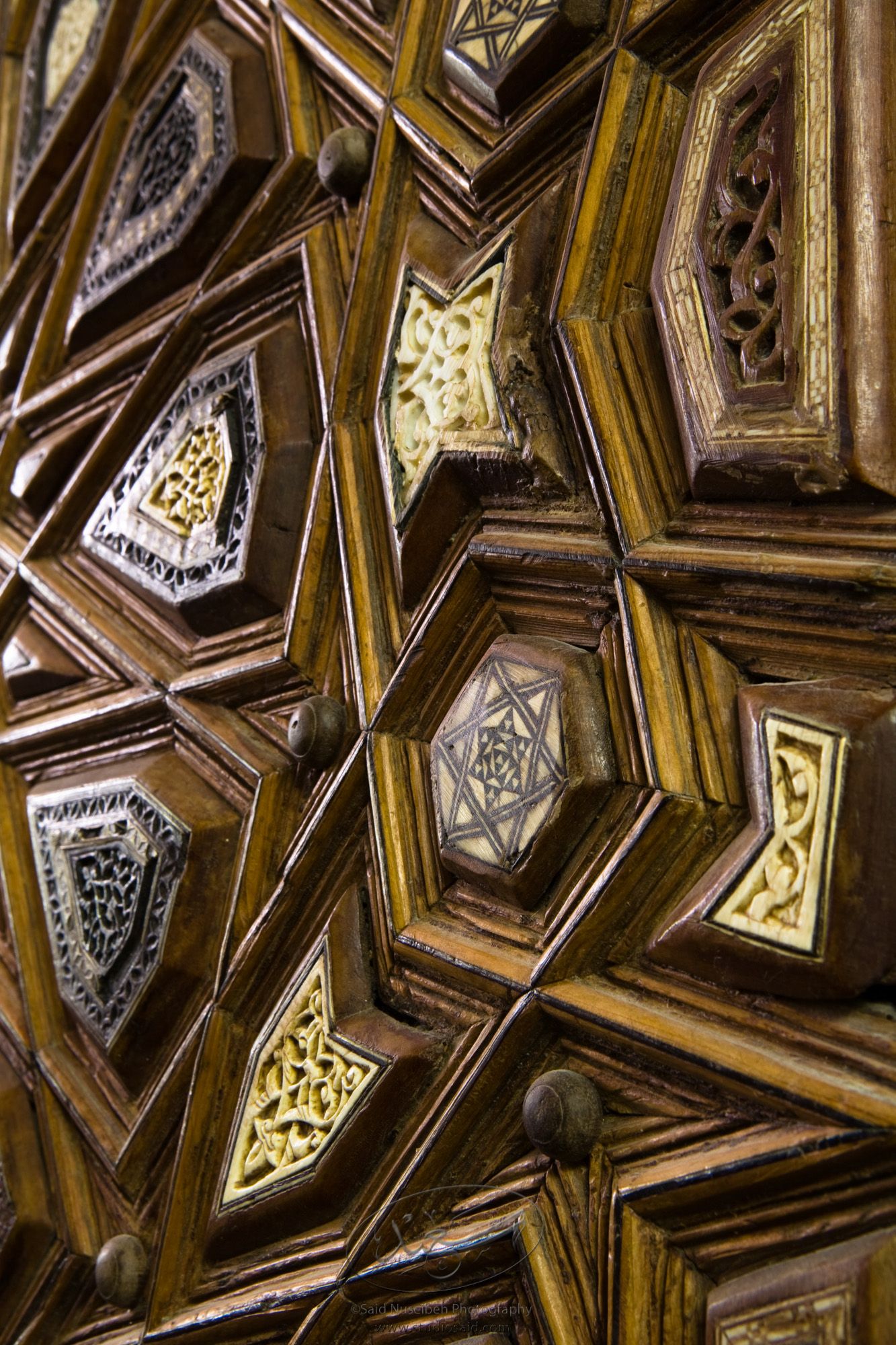 "Minbar, Carved Woodwork and Inlay Detail"The late-13th / early-14th c. Mamluk minbar, or pulpit, of Sultan al-Nasir Muhammad, the ninth Mamluk Sultan from Cairo and son of Qalawun. The minbar was located in the Umayyad Mosque in Aleppo, Haleb, prior to its damage and disappearance in May 2013.