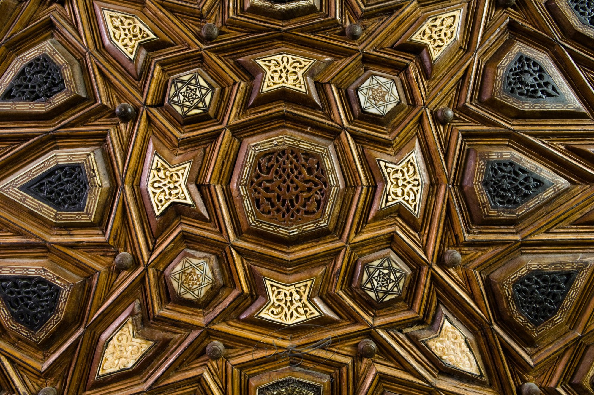 "Minbar, Carved Woodwork and Inlay Detail"The late-13th / early-14th c. Mamluk minbar, or pulpit, of Sultan al-Nasir Muhammad, the ninth Mamluk Sultan from Cairo and son of Qalawun. The minbar was located in the Umayyad Mosque in Aleppo, Haleb, prior to its damage and disappearance in May 2013.