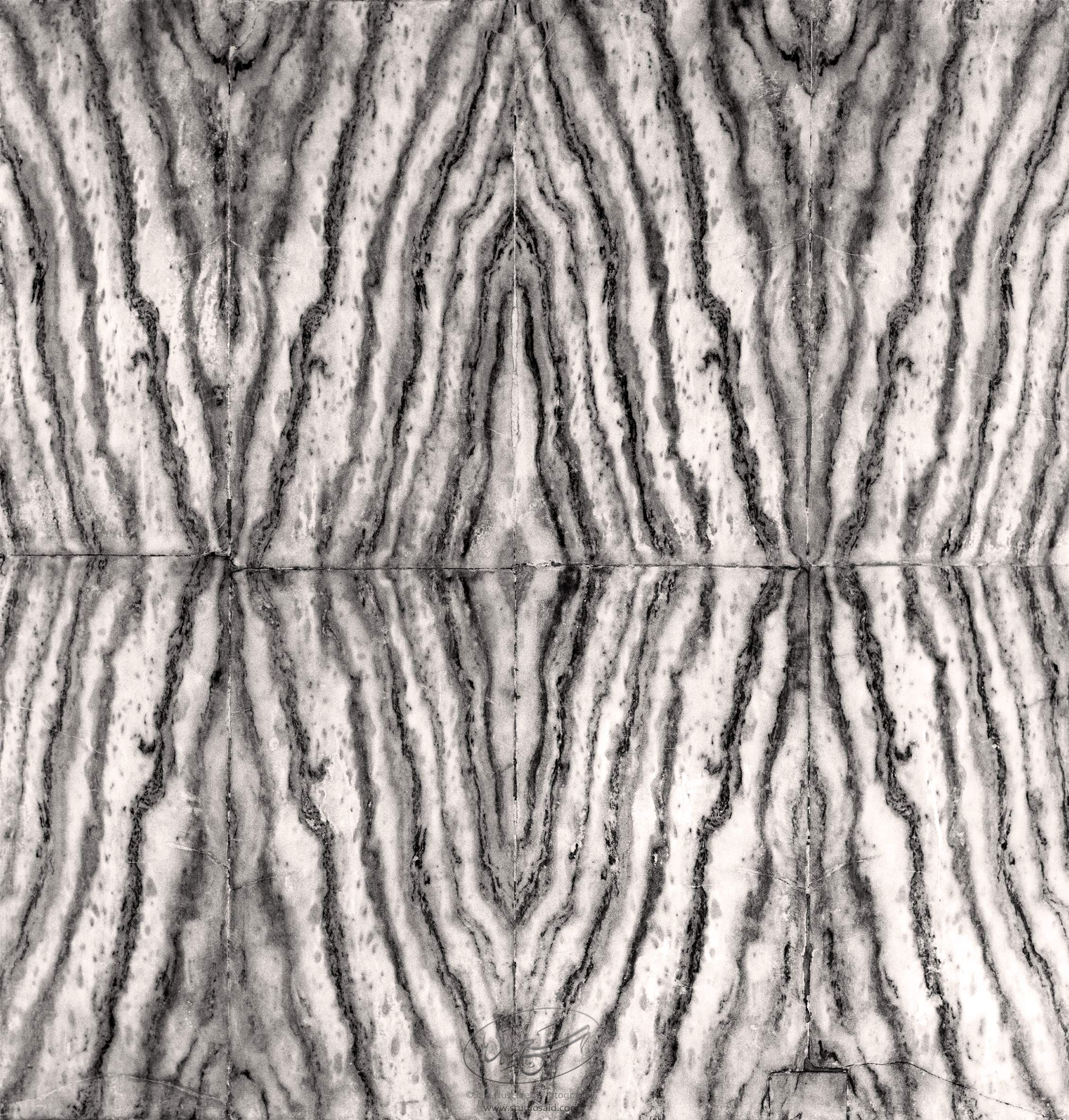 Bookmatched and quartersawn marble cladding in the <i>Qubbat al-Sakhra</i> / Dome of the Rock, Masjid al-Aqsa, Jerusalem <i>alQuds</i>.