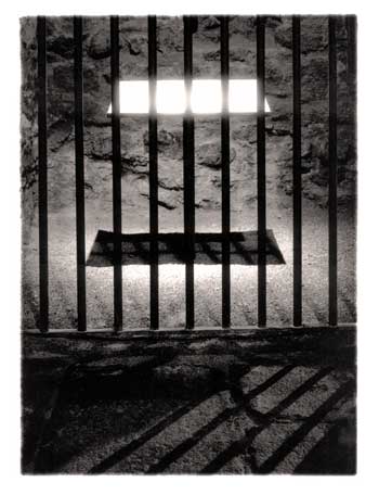 Floating stone tablet behind bars from Puerta de Bisagra, Toledo, Andalucia, Espa&ntilde;a Spain