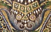 Detail of acanthus leaves and jewel- & pearl-studded gold necklace dangling pearls and gold ornaments.